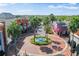 High-angle view of a town center with a central fountain, brick walkways, and stylish commercial buildings at 10011 Parley Dr, Tampa, FL 33626