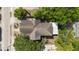 Birds eye view of a charming home with a well maintained roof and verdant surroundings at 105 W Columbus Dr, Tampa, FL 33602