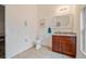 Bright bathroom with tiled floors, marble vanity, and a neutral color palette at 105 W Columbus Dr, Tampa, FL 33602