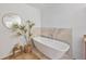 Bright bathroom highlighting a soaking tub and tiled surround at 105 W Columbus Dr, Tampa, FL 33602