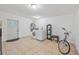 Functional laundry room with machines, storage and a door to the exterior at 105 W Columbus Dr, Tampa, FL 33602