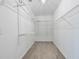 Bright walk-in closet featuring white wire shelving at 105 W Columbus Dr, Tampa, FL 33602