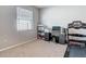 This office space provides a desk and treadmill, perfect for productivity and exercise at 10978 Laxer Cay Loop, San Antonio, FL 33576