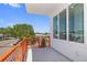 Balcony view of street with orange railing at 11 29Th N St, St Petersburg, FL 33713