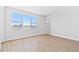 A bright bedroom with a large window and wood floor at 11 29Th N St, St Petersburg, FL 33713