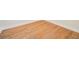 Close up of hardwood floors with white baseboards along the walls at 1120 E Kennedy Blvd # 615, Tampa, FL 33602