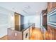 Kitchen island equipped with sink, drawers, and wooden cabinets at 1120 E Kennedy Blvd # 615, Tampa, FL 33602