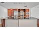 Kitchen with island and stainless steel appliances including refrigerator and microwave at 1120 E Kennedy Blvd # 615, Tampa, FL 33602