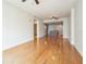 Open-concept living space with hardwood floors and views of the kitchen and adjacent room at 1120 E Kennedy Blvd # 615, Tampa, FL 33602