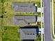 Overhead perspective of the homes, highlighting the neatly arranged landscaping and modern roofing at 11268 Fieldstone Dr, Palmetto, FL 34221