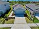 Charming single-story home boasts lush landscaping, a well-manicured lawn, and a long private driveway at 11268 Fieldstone Dr, Palmetto, FL 34221