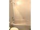 Bathroom with a modern-style tub and tiled walls at 11468 Captiva Kay Dr, Riverview, FL 33569