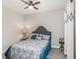 Cozy bedroom with a comfortable bed, soft lighting, and stylish decor at 13539 Circa Crossing Dr, Lithia, FL 33547
