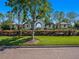Community entrance with unique architectural design and well manicured landscaping for curb appeal at 13539 Circa Crossing Dr, Lithia, FL 33547