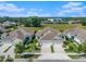 A lovely exterior of a residential community displaying attached garages, and well maintained lawns at 13539 Circa Crossing Dr, Lithia, FL 33547