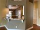 Granite kitchen counter with white cabinets offering ample counter space at 1415 Saddle Gold Ct, Brandon, FL 33511