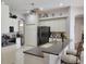 Spacious kitchen featuring a breakfast bar, stainless steel appliances, and tile flooring at 16106 Bridgedale Dr, Lithia, FL 33547