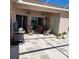 Covered patio with ceiling fans, grill, and outdoor seating at 16106 Bridgedale Dr, Lithia, FL 33547