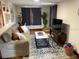 Inviting living room with comfortable seating, stylish rug, and modern decor at 1626 27Th N Ave, St Petersburg, FL 33713