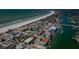 Coastal community aerial view, showing beach access, boat docks, and residential area at 1700 Pass A Grille Way # 9, St Pete Beach, FL 33706