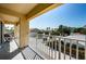 Outdoor balcony with seating offers neighborhood views and pleasant outdoor living at 1700 Pass A Grille Way # 9, St Pete Beach, FL 33706