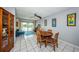 Living room boasts tile flooring, ceiling fan and sliding glass doors to balcony with beautiful views at 1700 Pass A Grille Way # 9, St Pete Beach, FL 33706