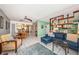 Spacious living area flows to the dining room and offers comfortable seating and lots of natural light at 1700 Pass A Grille Way # 9, St Pete Beach, FL 33706