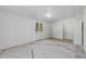 Finished basement with neutral carpeting, white walls, and overhead lighting at 17111 Mockingbird Ln, Lutz, FL 33548