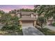 Charming home featuring a two-car garage, a tile roof, and inviting curb appeal at 17537 Fairmeadow Dr, Tampa, FL 33647