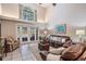 Living room boasting high ceilings, tile floors, and plenty of natural light with backyard view at 17537 Fairmeadow Dr, Tampa, FL 33647