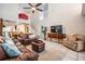 The living room features a soaring ceiling, tile floors, and open floor plan at 17537 Fairmeadow Dr, Tampa, FL 33647