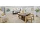 Open living space with kitchen, dining area and cozy sitting area with modern decorations at 1905 Oro Ct, Clearwater, FL 33764