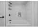 Elegant shower featuring white marble tiling with a mosaic shelf niche at 1905 Oro Ct, Clearwater, FL 33764