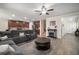 Comfortable living room featuring a fireplace, tile floors, and an open layout at 19278 Roseate Dr, Lutz, FL 33558