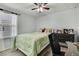 Bedroom with wood look floors and a desk area at 19796 Long Lake Ranch Blvd, Lutz, FL 33558