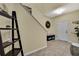 Cozy entryway with a tiled floor, bench, and decorative wall art at 19796 Long Lake Ranch Blvd, Lutz, FL 33558