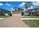 Charming two-story home featuring a two car garage and well-maintained landscaping at 19796 Long Lake Ranch Blvd, Lutz, FL 33558