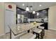 Modern kitchen with granite countertops, stainless steel appliances, and a large island with seating at 19796 Long Lake Ranch Blvd, Lutz, FL 33558