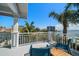Balcony with seating featuring beautiful views of the waterfront at 213 Harrison Ave, Belleair Beach, FL 33786