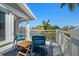 Balcony with seating featuring beautiful views of the waterfront at 213 Harrison Ave, Belleair Beach, FL 33786