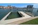 Dock and boat lift with waterfront living at 213 Harrison Ave, Belleair Beach, FL 33786