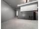 Spacious garage with an epoxy floor at 213 Harrison Ave, Belleair Beach, FL 33786