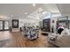 Inviting living room features high ceilings, water views, unique decor, and modern furnishings at 213 Harrison Ave, Belleair Beach, FL 33786