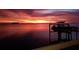 Beautiful waterfront view with gorgeous sunset and boat lift at 2172 Harbor View Dr, Dunedin, FL 34698
