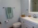 Clean bathroom featuring a modern sink and vanity, with a towel rack and toilet at 224 Cypress Ln # 224, Oldsmar, FL 34677