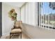Bright and airy balcony seating area with natural light and tranquil outdoor views at 2614 Cove Cay Dr # 207, Clearwater, FL 33760