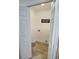 Cozy laundry room with wood-look floor and ample space for laundry needs at 2869 Thistle N Ct, Palm Harbor, FL 34684