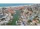 Breathtaking aerial view showcases canal-front homes, each equipped with private boat docks and beautiful waterfront access at 301 Boca Ciega Dr, Madeira Beach, FL 33708