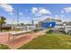 Waterfront backyard with a patio offering scenic views of boats docked along the canal at 301 Boca Ciega Dr, Madeira Beach, FL 33708