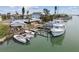 Waterfront property with private boat dock, multiple boats, and easy water access at 301 Boca Ciega Dr, Madeira Beach, FL 33708